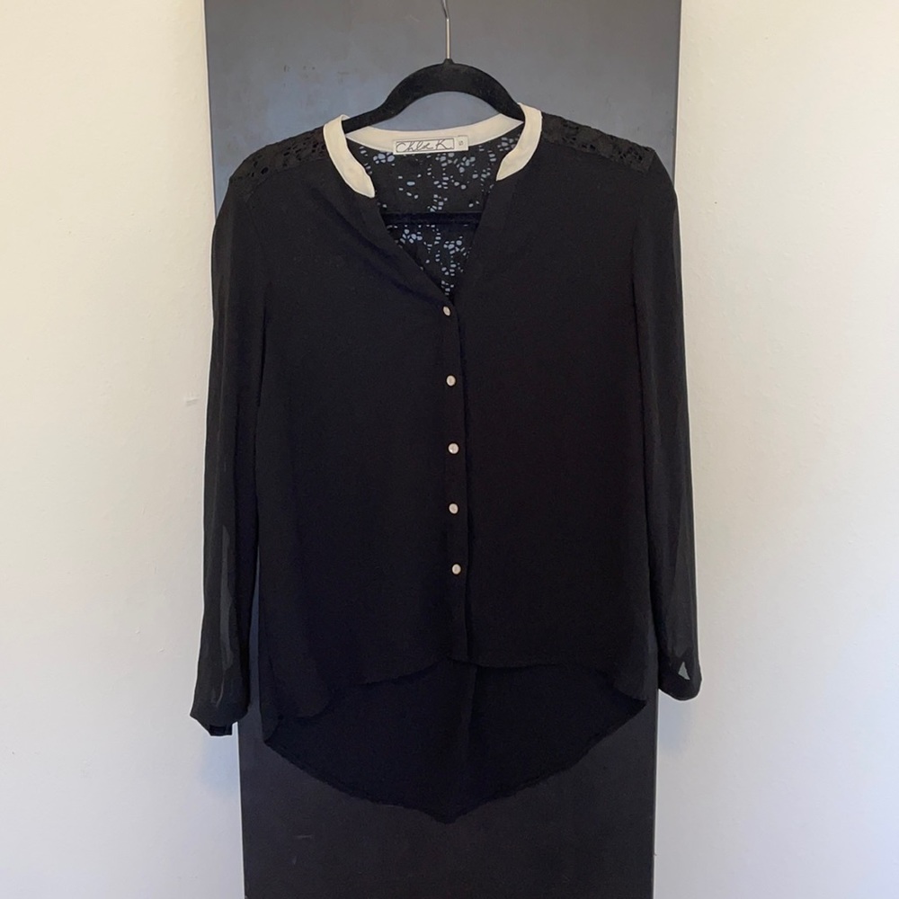 Sheer black blouse with lace and pearl detail